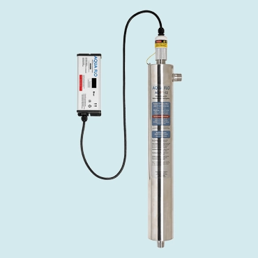 Ultraviolet water purification system with a stainless steel chamber connected to an electronic control unit by a black cable.
