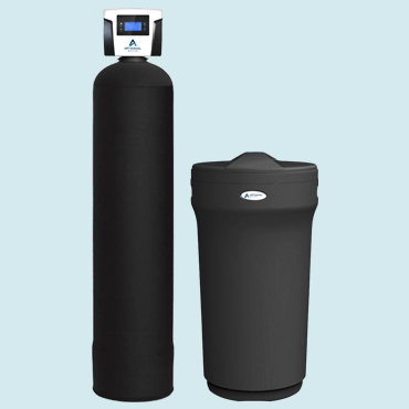 Two water softener units against a pale blue background, one tall with a digital display and one shorter with a curved lid.
